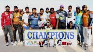 United Challengers, winners of the NPL National Sport Day cricket championship pose for a picture with the trophies.