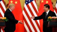 File photo of US President Donald Trump and China's President Xi Jinping make joint statements at the Great Hall of the People in Beijing, China, November 9, 2017. REUTERS/Jonathan Ernst