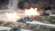 File photo of South Korean Army K1A1 and US Army M1A2 tanks fire live rounds during a US-South Korea joint live-fire military exercise, at a training field, near the demilitarized zone, separating the two Koreas in Pocheon, South Korea April 21, 2017. REU