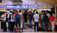 Tourists wait in the departures hall at Velana International Airport in Male, Maldives February 13, 2018. Reuters/Stringer