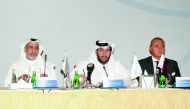 Sheikh Jassim bin Hamad bin Jassim bin Jaber Al Thani (centre) Chairman , QIB; Abdullatif bin Abdulla Al Mahmoud (left), Vice Chairman, QIB; and Bassel Gamal, CEO of the bank, during  QIB Ordinary and Extraordinary General Assembly meeting, yesterday. Pic