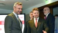 Austrian Minister of Transport Norbert Hofer (L) and Russian Minister of Transport Maxim Sokolov arrive for a signing ceremony of a cooperation agreement on freight transport between Austrian railways and Russian railways on February 21, 2018 in Vienna, A