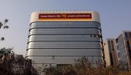 The logo of Punjab National Bank is seen on the facade of its office in Mumbai, India, February 21, 2018. REUTERS/Danish Siddiqui

