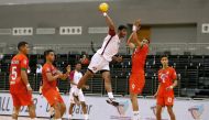 A Qatari player shoots to score during their opening fixture of the 24th ISF World Schools Handball Championships  against Morocco at the Ali bin Hamad Al Attiyah Stadium in Al Sadd yesterday. 
