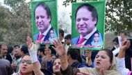 Supporters of ousted Pakistani prime minister Nawaz Sharif shout slogans against the Supreme Court verdict outside an accountability court where Sharif arrived to face corruption charges in Islamabad on February 22, 2018. AFP / Aamir Qureshi