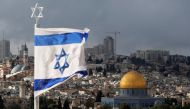 An Israeli flag is seen near the Dome of the Rock, located in Jerusalem's Old City on the compound known to Muslims as Noble Sanctuary, December 6, 2017. Reuters/Ammar Awad