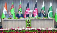 Afghan President Ashraf Ghani (C) with Gurbanguly Berdymukhamedov President of Turkmenistan (2L), Pakistani Prime Minister Shahid Khaqan Abbasi (R) and India's External Affairs Minister Shri M. J. Akbar (L) look on during the (TAPI) gas pipeline project i