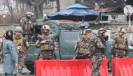 Afghan officials inspect the site after a suicide bomb attack in the Shash Darak area of Kabul, near NATO headquarters and not far from the US Embassy in Kabul, Afghanistan on February 24, 2018. Haroon Sabawoon / Anadolu Agency