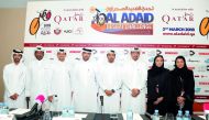 Jamal Al Kuwari (third left), General Secretary, QTCF; Dr Mohamed Jaham Al Kuwari (fourth left), President, Qatar Cycling and Triathlon Federation (QCTF); Dr Abdulaziz Al Kuwari (fourth right), President, Qatar Cyclists Center; Dr Jamal Rashid Al Khanji (