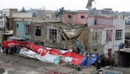People gather at the site of a suicide bomb attack in Kabul, Afghanistan March 2, 2018. REUTERS/Omar Sobhani