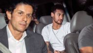 Brazilian superstar Neymar (R), is pictured next to his doctor Rodrigo Lasmar (L), upon his arrival in Belo Horizonte, Minas Gerais state, Brazil on March 2, 2018 ahead of an operation on his fractured foot.  AFP / NELSON ALMEIDA
