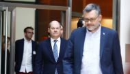 Dietmar Nietan (R) and Olaf Scholz of Social Democratic Party (SPD) attend a news conference to announce the results of the voting for a possible coalition between the Social Democratic Party (SPD) and the Christian Democratic Union (CDU) in Berlin, Germa