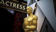 An Oscar statue is seen outside the Dolby Theatre during preparations for the Oscars in Hollywood, Los Angeles, California, U.S. March 3, 2018. REUTERS/Lucy Nicholson
