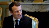 FILE PHOTO: French President Emmanuel Macron attends a meeting at the Elysee Palace in Paris, France, December 19, 2017. REUTERS/Philippe Wojazer/File Photo
