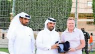 Officials of Al Gharafa SC presenting a souvenir to Netherlands coach Ronald Koeman during his visit to Qatar.
