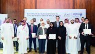 Officials and participants at the QDB training session on ‘Best Practices and Innovation in Customer Relationship Management.’