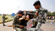 FILE PHOTO: Tibetan activists detained by police in New Delhi, India, March 10, 2017. REUTERS/Cathal McNaughton/File photo
