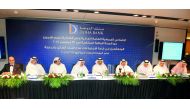 Sheikh Fahad bin Mohammad bin Jabor Al Thani (fifth left), Chairman, Doha Bank; Abdul Rahman bin Mohammad bin Jabor Al Thani, (fourth right) Managing Director, Doha Bank; Dr R Seetharaman (left), Group CEO, Doha Bank; and other board members and officials