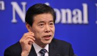 Chinese Commerce Minister Zhong Shan attends a news conference on the sidelines of the National People's Congress (NPC) in Beijing, China March 11, 2018. REUTERS/Stringer 
