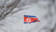 The North Korean flag flies above the North Korean embassy in Beijing on March 9, 2018. US President Donald Trump agreed to a historic first meeting with North Korean leader Kim Jong Un in a stunning development in America's high-stakes nuclear standoff w
