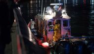 New York Fire Department boat conducts a search and rescue operation after a helicopter crashed into New York City's East River on Sunday evening that left five people dead, in New York, United States on March 12, 2018. Michael Potash - Anadolu 
