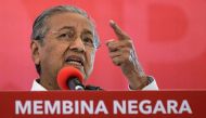 This picture taken on March 8, 2018 shows former Malaysian prime minister and opposition prime ministerial candidate Mahathir Mohamad gesturing during his speech after launching the four-party coalition Pact of Hope (Pakatan Harapan) election manifesto in