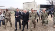 US Defense Secretary Jim Mattis (C) walks with US General John Nicholson (centre R) at the Resolute Support Mission headquarters on an unannounced visit to Kabul on March 13, 2018.AFP / Thomas Watkins 