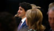 Canada's Prime Minister Justin Trudeau receives the 2018 Catalyst for Change Award and delivers remarks at the Equal Voice International Women's Day Lunch in Toronto, Ontario, Canada, March 8, 2018. REUTERS/Chris Donovan