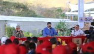 Venezuela's President Nicolas Maduro (C) speaks during an event regarding the CLAP (Local Committees of Supply and Production) program, a Venezuelan government handout of basic food supplies, in Caracas, Venezuela March 12, 2018. Miraflores Palace
