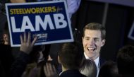 Conor Lamb, Democratic congressional candidate for Pennsylvania's 18th district, greets supporters at an election night rally March 14, 2018 in Canonsburg, Pennsylvania. Drew Angerer/Getty Images/AFP