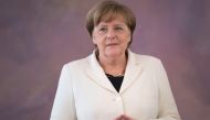 German Chancellor Angela Merkel waits to be given her certificate of appointment by the German President on March 14, 2018 at Bellevue Palace in Berlin.   AFP / Stefanie LOOS
