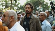 (FILES) In this file photo taken on January 6, 2017 Indian actor Irfan Khan (C) arrives to pay last respects to the deceased Indian actor Om Puri for his funeral in Mumbai. AFP / Punit Paranjpe 
