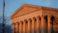 File photo: Light from the setting sun shines on the Supreme Court in Washington, DC, U.S., January 20, 2018. REUTERS/Joshua Roberts/File Photo
 