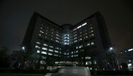 FILE PHOTO: A van is seen on a road in front of Tokyo Regional Immigration Bureau which includes the Tokyo detention center in Tokyo, Japan. REUTERS
