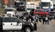 The vehicle that the Austin package bomber, Mark Anthony Conditt, was driving when he blew himself up is towed from the crime scene along Interstate 35 in suburban Austin on March 21, 2018 in Round Rock, Texas.  Scott Olson/Getty Images/AFP
