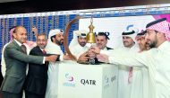 Rashid bin Ali Al Mansoori (third left), CEO, Qatar Stock Exchange; Haithem Al Katerji (center), Chief investment officer at Al Rayyan Investment; Akber Khan (second left) Senior Director-Asset Management, Al Rayyan Investment Group; along with other offi