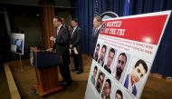 Deputy Attorney General Rod Rosenstein speaks at a press conference at the Department of Justice March 23, 2018 in Washington, DC. Win McNamee/Getty Images/AFP