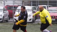 Two players vie for the ball during a soccer match between The Galaxy and Los Ombligones, as part of the 