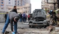 An Egyptian forensics team checks the location of a bombing in Alexandria, Egypt March 24, 2018. REUTERS/Fawzy Abdel Hamied
