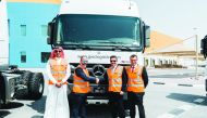 Top officials of NBK and GWC, standing next to Actros 2041 trucks in Logistics Village Qatar (LVQ), GWC’s 1M sqm logistics infrastructure serving Qatar’s logistical aspirations of the future.