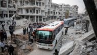 A third convoy of vehicles carrying civilians from Eastern Goutha to Hama are seen in Damascus, Syria on March 24, 2018. ( Khaled Akasha - Anadolu Agency )