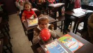 Syrian school children are seen at their classroom al-Caviz village northwestern Syria's Afrin on March 26, 2018. Halil Fidan - Anadolu
