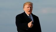 U.S. President Donald Trump gives thumbs-up as he returns from Palm Beach, Florida, at Joint Base Andrews in Maryland, U.S., March 25, 2018. REUTERS/Joshua Roberts
