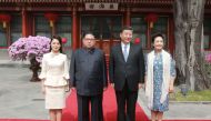 This picture from North Korea's official Korean Central News Agency (KCNA) taken on March 27, 2018 and released on March 28, 2018 shows China's President Xi Jinping (2nd R), his wife Peng Liyuan (R), North Korean leader Kim Jong Un (2nd L) and his wife Ri