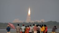 (FILES) In this file photo taken on March 29, 2018, shows Indian onlookers watching as the Indian Space Research Organisation's (ISRO) GSAT-6A communications satellite launches on the Geosynchronous Satellite Launch Vehicle (GSLV-F08) from Sriharikota in 