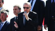 President of Turkey and leader of Turkey's ruling Justice and Development Party (AK Party) Recep Tayyip Erdogan addresses the crowd ahead of the AK Party's 6th ordinary provincial congress in Adana province of Turkey on April 1, 2018. Eren Bozkurt - Anado