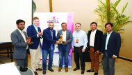 Senior officials of ASC posing with the ‘Best Distributor in the Middle East’ award region for 2017.