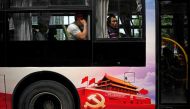 Passengers are seen on a bus promoting the 19th National Congress of the Communist Party of China in Shanghai, China, September 26, 2017. (Reuters / Aly Song) 