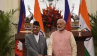 Indian Prime Minister Narendra Modi (R) and Prime Minister of Nepal K.P. Sharma Oli look on during the inauguration of India-Nepal petroleum products pipeline and the Integrated Check Post (ICP), at Hyderabad house, in New Delhi on April 7, 2018. / AFP / 