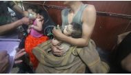 An affected Syrian child receives medical treatment after Assad regime forces allegedly conducted poisonous gas attack to Duma town of Eastern Ghouta in Damascus, Syria on April 07, 2018. Halil el-Abdullah - Anadolu